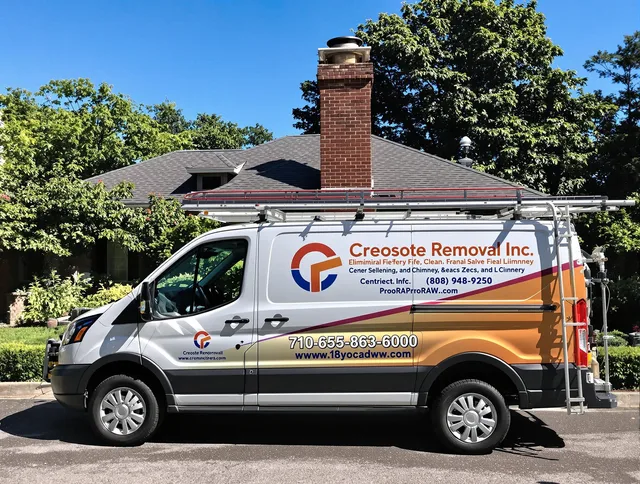 Alafaya Chimney Sweep technician removing creosote safely in Alafaya, FL