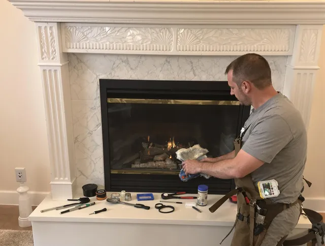 Alafaya Chimney Sweep performing fireplace maintenance in Alafaya, FL